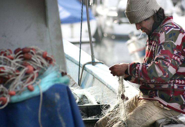 Pêcheur sur son bateau