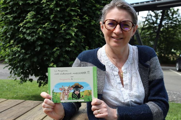Fabienne Touchais Raimbault, créatrice de la collection de livres « La Mayenne, c'est vachement mieuuhhh ». Son objectif est de « valoriser la Mayenne, de faire découvrir aux enfants ce qu'ils ont tout près d'eux pour leur donner envie d'explorer et, pourquoi, faire naître des vocations ».