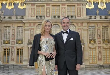 L'actrice Diane Kruger, égérie de la maison Martell, aux côtés du PDG de l'entreprise, Philippe Guettat