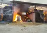<em class="placeholder">Le hangar et tout son contenu ont pris feu.</em>