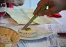 Fromage en train d'être coupé lors du Concours Saveurs Nouvelle-Aquitaine des fromages de chèvre fermiers et artisanaux 