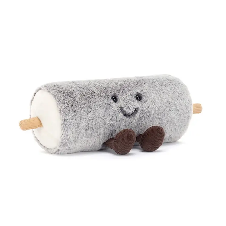 Peluche en forme de bûchette de chèvre