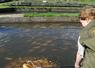 Corinne Sauvegrain, 56 ans, est exploitante de la pisciculture de Bernay. Investie dans son activité, elle œuvre au quotidien pour faire vivre et développer son exploitation, avec un attachement fort à son territoire et à la qualité de sa production.