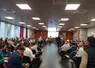 Dans une salle au Palais des Congrès de Perpignan, près de 180 personnes disposées en deux hémicycles débattent.