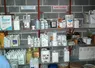 <em class="placeholder">Local phyto. Stockage des produits phytosanitaires par catégories : insecticides, régulateurs et adjuvants. Bidons et cartons rangés sur des étagères. Pesticides .</em>