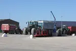 <em class="placeholder">Bennes arrivant à la coopérative.</em>