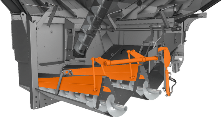 Les vis de fond de trémie des moissonneuses-batteuses Ideal de Fendt et Massey Ferguson sont surmontées de trappes hydrauliques permettant d’ajuster le débit de vidange.