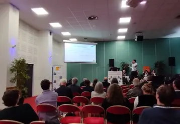 Photo d'un intervenant lors d'une conférence sur le réchauffement climatique lors des JTIC 2025