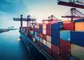 Container ship carrying container boxes import export dock with quay crane. Business commercial trade global cargo freight shipping logistic and transportation worldwide ...