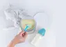 <em class="placeholder">poudre de lait infantile avec un biberon</em>
