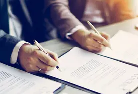 <em class="placeholder">Business young people in the job interview, signed an employment contract with boss in the office</em>