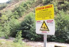 Des panneaux de prévention sur les berges