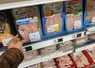 Acte d'achat de poulet en barquette en magasin