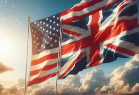 un drapeau des etats-unis et un drapeau du royaume uni flottent au vent cote sur fond de ciel bleu 