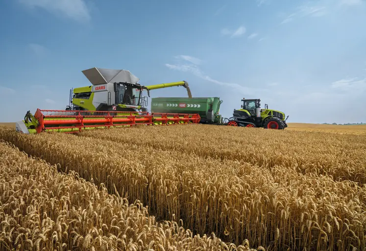 <em class="placeholder">Moissonneuse-batteuse Claas Lexion 8700 Terra Trac avec transbordeur Hawe ULW 4000 et tracteur Claas Axion Terra Trac</em>
