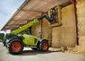 Chargeur télescopique Claas Scorpion à la manutention de balles de paille