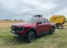 <em class="placeholder">Ford Ranger Wildtrak X sur des chaumes d&#039;orge avec presse New Holland Pro-Belt et tracteur New Holland T7.210</em>