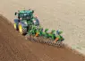 <em class="placeholder">Charrue Amazone équipé d&#039;un rouleau tasseur attelé à un tracteur John Deere</em>