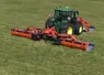 <em class="placeholder">Tracteur John Deere avec faucheuse à disques Kuhn GMD 9530 RV dotée d’un groupeur à vis</em>
