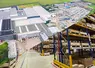 <em class="placeholder">Vues aérienne et intérieure du centre logistique Heeslingen de Granit Parts</em>