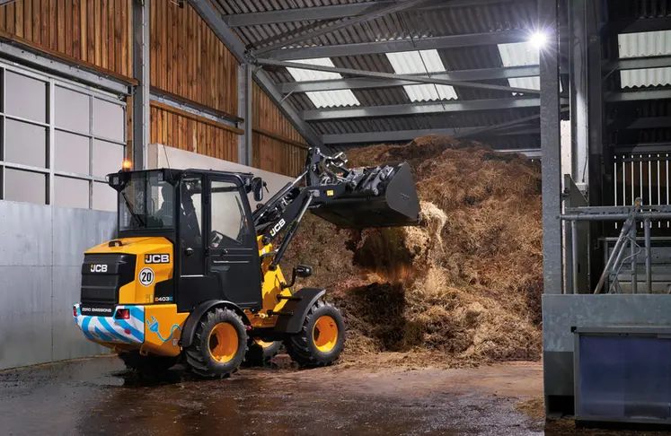 <em class="placeholder">Valet de ferme électrique JCB 403E Cab,au chargement du fumier.</em>