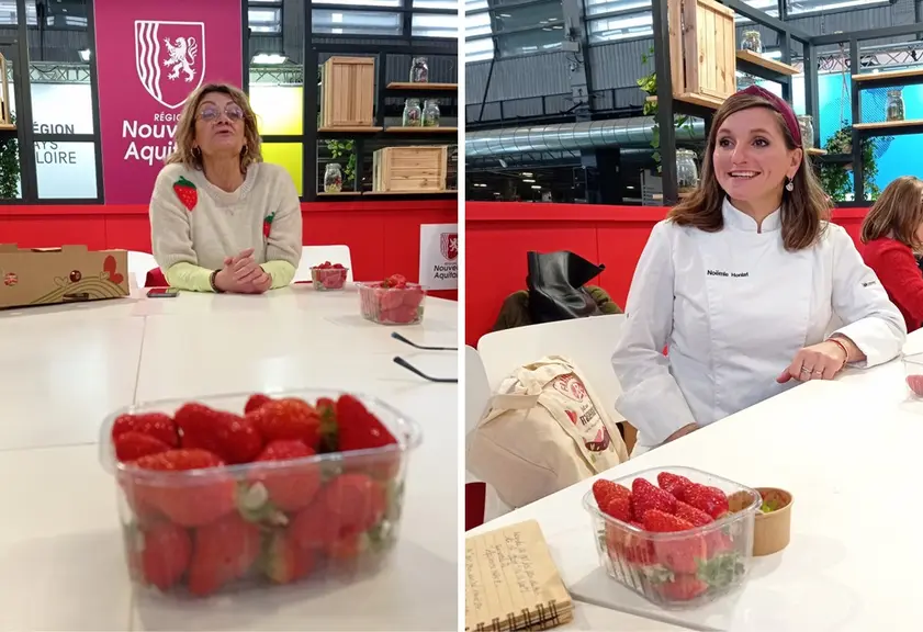 La productrice de fraises Label Rouge Sylvie Delaurier-Zanuttig et la cheffe pâtissière Noëmie Honiat, sur un stand sur le salon de l’agriculture, ave