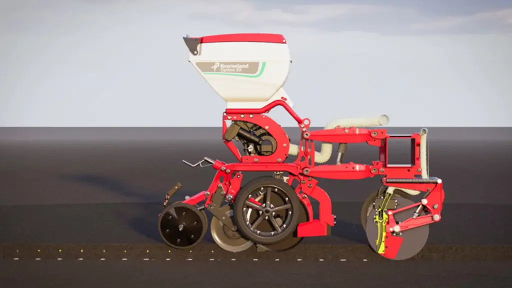 Le semoir monograine Optima doté de la technologie Pudama libère l'engrais starter par paquet précisément sous la graine.