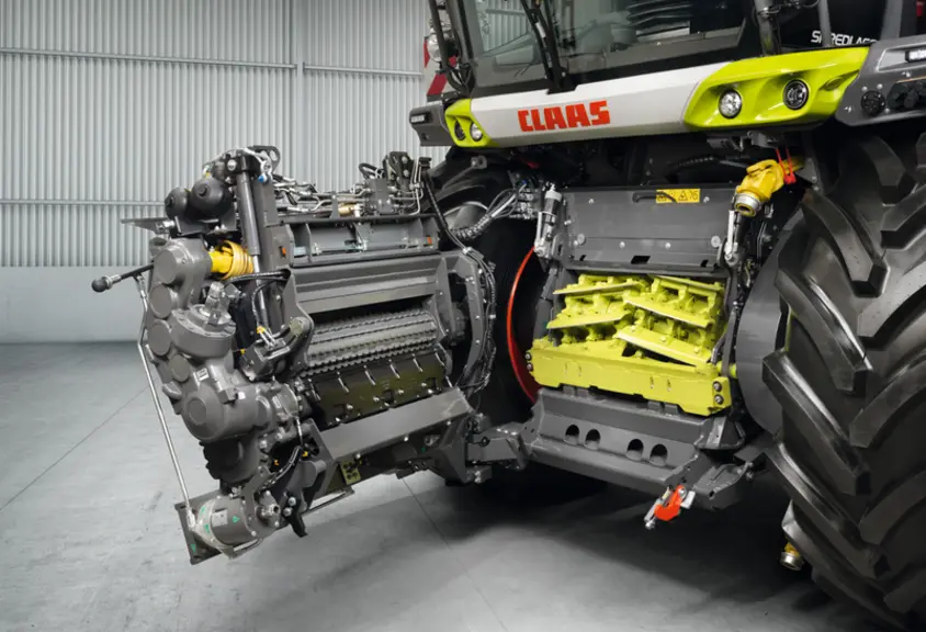 <em class="placeholder">Vue du rotor et des rouleaux d'alimentation de l'ensileuse Claas Jaguar 1000</em>