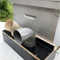 Ruche équipée d’une muselière à tubes.
