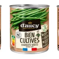 Boîtes de légumes petits pois et haricots verts d'aucy de la gamme Bien cultivés avec le logo Origin'Info.