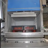 Traitement de potimarrons avec la machine de douchage à l'eau chaude de l'entreprise Crovara.