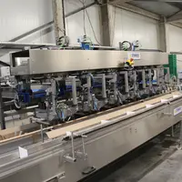 Le robot de bottelage d'asperges de Strauss.