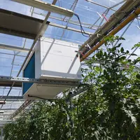 déshumidificateur installer dans une serre verre chauffée de tomates.