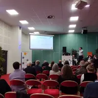 Photo d'un intervenant lors d'une conférence sur le réchauffement climatique lors des JTIC 2025