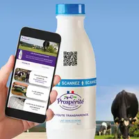 La nouvelle bouteille de lait et l'application mobile.  © Prospérité fermière ...