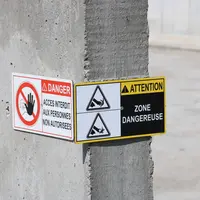Dans le cas de l'automate Aura de Kuhn qui désile, des panneaux de sécurité sont apposés à chaque entrée de silo.