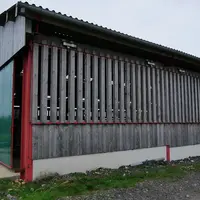 Bardage coulissant en bâtiment laitier