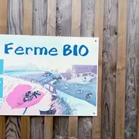 panneau ferme bio sur un mur