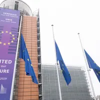 View of the European flags at half-mast at the Berlaymont