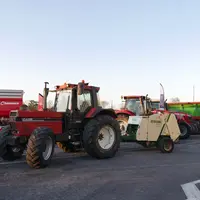 Case IH 1455 XL avec presse à balles rondes KR125