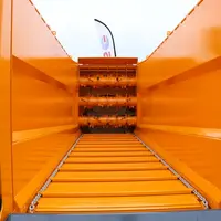 Ces deux pailleuses reçoivent trois démêleurs à entraînement mécanique. © 5 Portier