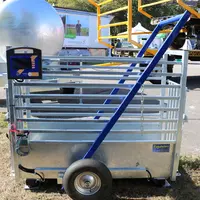 La cage de pesée Pasdelou pour les veaux reçoit deux roues de transport © M. Portier