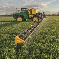 Les automoteurs de pulvérisation John Deere R4140i et R4150i peuvent intégrer le dispositif de buses à pulsation ExactApply. © John Deere