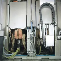 Le robot de traite Gemini de Boumatic à deux stalles ne dispose que d'un seul bras de pose © Boumatic