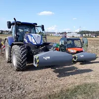 Le SoilXplorer est le capteur monté à l'avant de ce tracteur et de ce SSV. © Geoprospectors