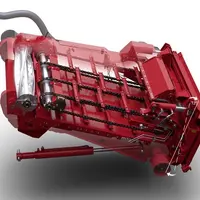Case IH n’utilise pas de tambour d’alimentation sur les Axial-Flow, mais il monte un rouleau épierreur actif en partie haute du convoyeur.