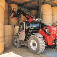 Manitou MLT NewAg XL à la manutention de balles rondes