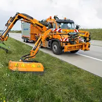 Mercedes Unimog avec deux bras de débroussaillage Mulag et groupe de fauche Eco 1200 Plus