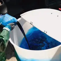 Opérateur avec EPI à l'incorporation de produits phytosanitaires