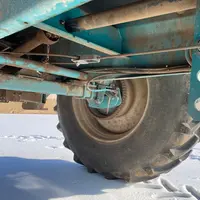 Système d'entraînement du tapis de fond de l'épandeur d'engrais traîné Sulky XT 130 Polyvrac
